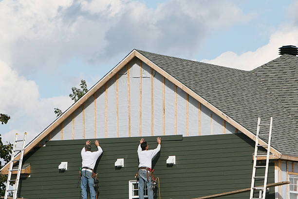 Professional Siding technician working in Trinity, FL